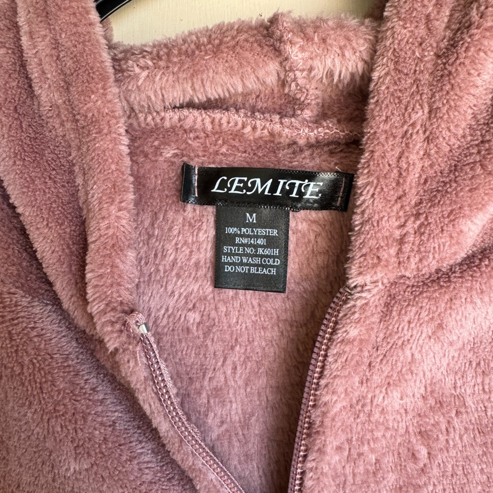 Women’s pink fleece hoodie. Very soft and cozy. Size medium.